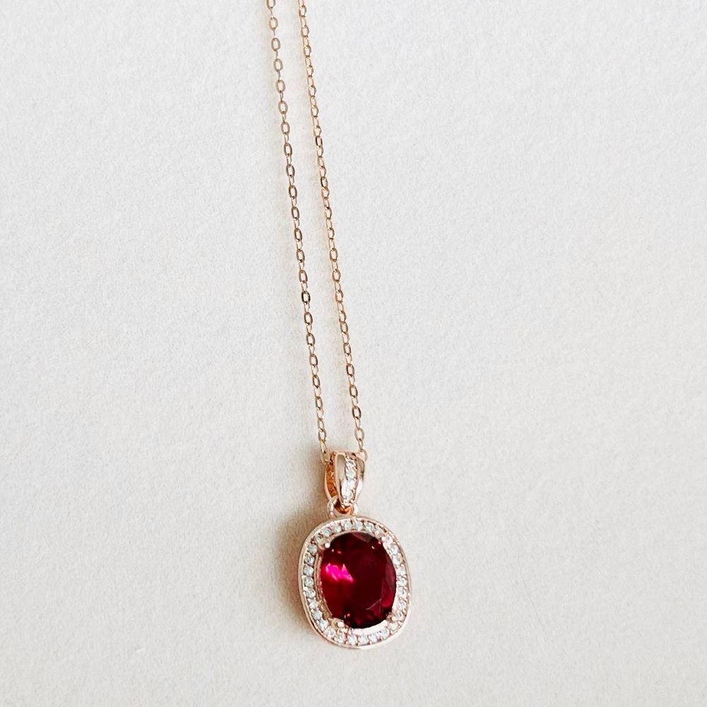 Oval Shape Ruby Rose Gold Halo Necklace